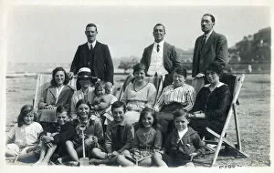 Large extended family group on a British beach