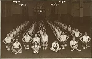 A large group of London Schoolgirls performing a synchronised aerobic gymnastic routine