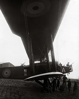 Large RAF aircraft setting off with bombs, WW1