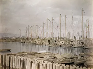 Large ships. trading junks, Kobe harbour, Japan