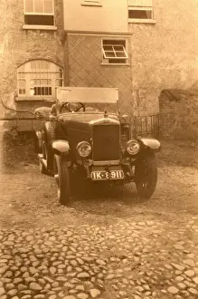 Large Tourer parked on the cobbles