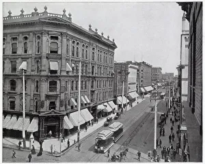 Larimer Street, Denver, the main thoroughfares in the city. Just 37 years after the first cabin was erected on the site of Denver in 1858. Date: circa 1895