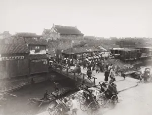 Late 19th century photograph: Bridge over river, busy with traffic, Shanghai, China Late 19th century photograph: Bridge over river, busy with traffic, Shanghai, China