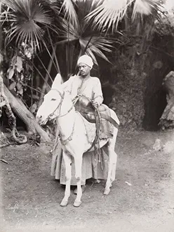 Late 19th century photograph: Egyptian man and his donkey, Egypt Late 19th century photograph: Egyptian man and his donkey, Egypt