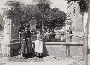 Late 19th century photograph: People with water jars, Public well, fountain, Cordoba Late 19th century photograph: People with water jars, Public well, fountain, Cordoba