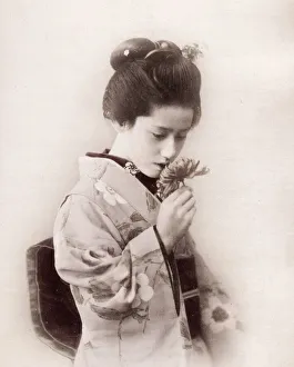 Teahouse Prints: Late 19th century - young Japanese woman and flower