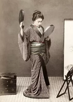 Kimono Gallery: Late 19th century - young Japanese woman with mirrors