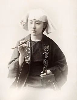Geisha Prints: Late 19th century - young Japanese woman with pipe