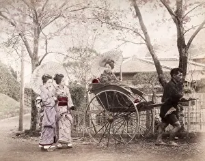 Late 19th century - young Japanese woman, rickshaw
