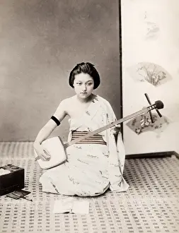 Late 19th century - young Japanese woman, shamisen