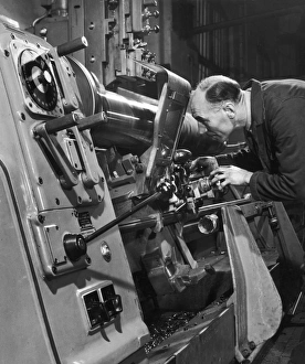 A lathe operator at work A lathe operator at work