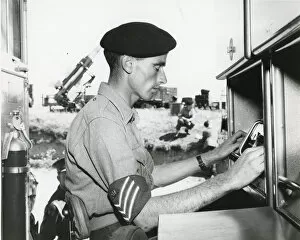 Checks Collection: Launcher Control Assistant, Sgt W. Lewis, of the 32nd G?