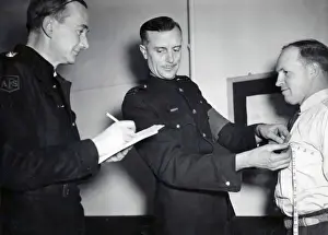 Measure Prints: LCC-LFB AFS volunteer measured for uniform, WW2