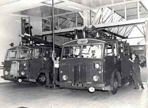 Images Dated 31st May 1960: LCC-LFB fire station appliance room with engines