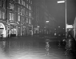Images Dated 31st May 1963: LCC-LFB Flooding caused by burst water main in street