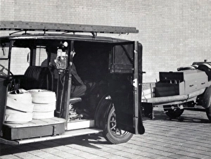 Images Dated 3rd October 2011: LFB adapted London taxi pulling a trailer pump, WW2