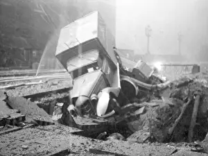 Southwark Prints: LFB fire towing unit and trailer pump in bomb crater, WW2