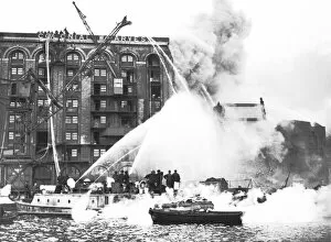 LFB fireboat Massey Shaw tackling a warehouse fire