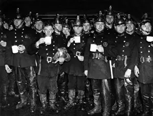 LFB firefighters grab a mug of tea from Brigade Canteen Van