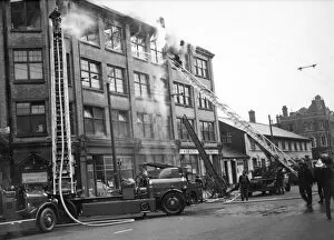 Messrs Collection: LFB turntable ladders in use at Hackney fire