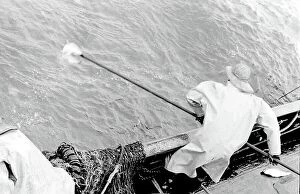 Nets Collection: Life on a North Sea trawler -- fisherman at work on deck. Date: 1960s