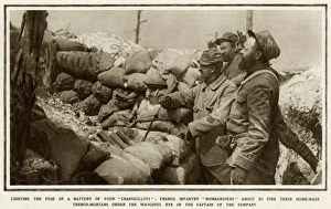 Images Dated 13th October 2017: Lighting the fuse of a battery of four crapouillots 1915