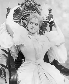 Lillian Prints: Lillian Russell, three-quarter length portrait, seated, with