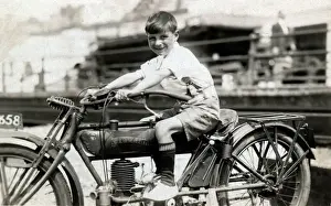 Youngster Prints: Little boy on a 1910 Cleveland motorcycle