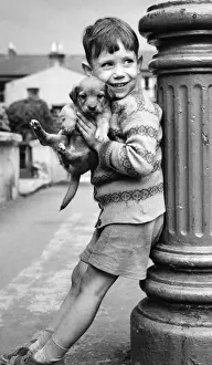 Grinning Prints: Little boy with puppy, Balham, SW London