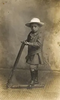 Scooter Prints: Little boy with scooter, c. 1900