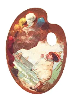 Little boy at the seaside on a palette-shaped greetings card