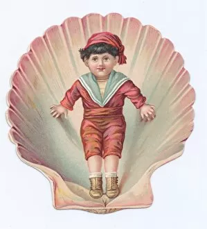 Little boy on a shell-shaped greetings card