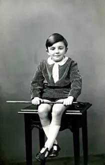 Wealthy Prints: Little boy sitting on a stool
