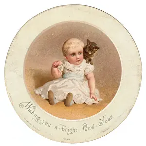 Little child with kitten on a circular New Year card