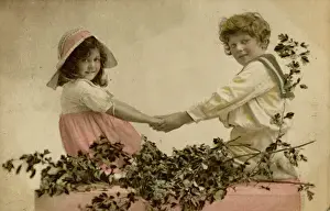 Little girl and boy holding hands