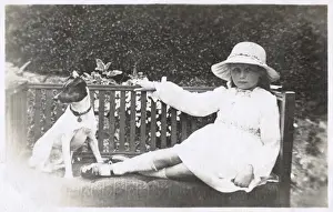 Socks Prints: Little girl and dog sitting on a bench