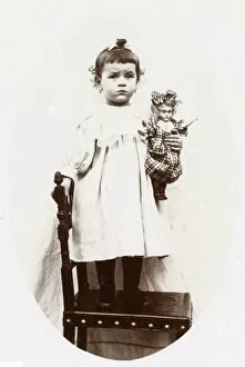 Little girl with doll, Normandy, France