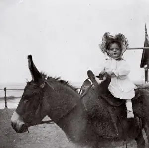 Little girl on a donkey, Saltburn, North Yorkshire