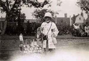 Feb18 Gallery: Little girl dressed up as a milk delivery person