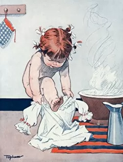Images Dated 7th April 2012: A little girl getting dressed into a one-piece dress