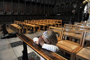 Praying Collection: A little girl kneels to say her prayers - Carlisle Cathedral