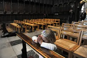 Hands Prints: A little girl kneels to say her prayers - Carlisle Cathedral