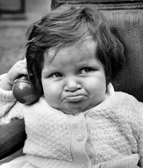 Woollen Prints: Little girl looking glum