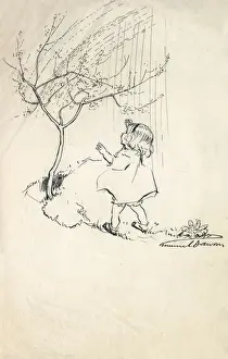 Little girl looking up at a tree