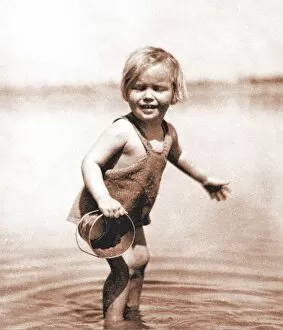 Paddling Gallery: Little girl paddling, with bucket