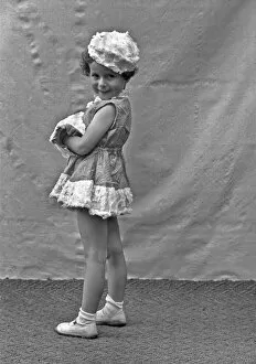 Expression Gallery: Little girl posing in a short dress