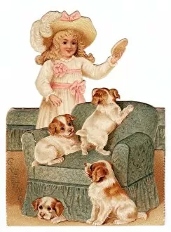 Images Dated 23rd November 2015: Little girl with four puppies on a cutout greetings card