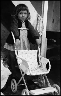 Pushchair Prints: Little girl with pushchair on stairs interior