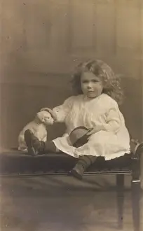 Little Girl and Toy Dog