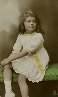 Trimmings Prints: Little girl in white dress with yellow trimmings